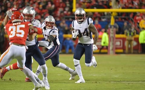 New England Patriots wide receiver Cordarrelle Patterson (84) carries the ball against the Kansas City Chiefs during the first half of the AFC Championship game at Arrowhead Stadium - Credit: USA TODAY