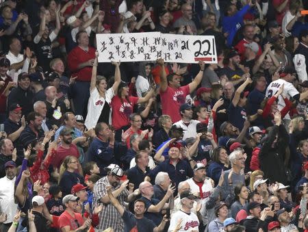 Sep 14, 2017; Cleveland, OH, USA; Fans celebrate after a Cleveland Indians extra-inning win over the Kansas City Royals at Progressive Field. Mandatory Credit: David Richard-USA TODAY Sports