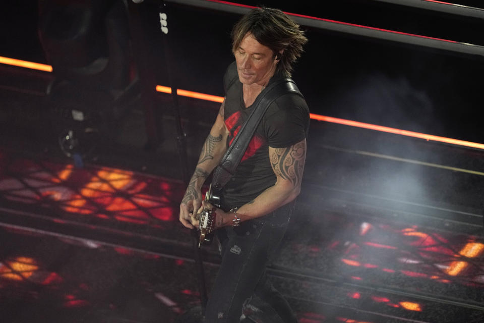 Keith Urban performs during an opening ceremony for the Formula One Las Vegas Grand Prix auto race, Wednesday, Nov. 15, 2023, in Las Vegas. (AP Photo/Darron Cummings)