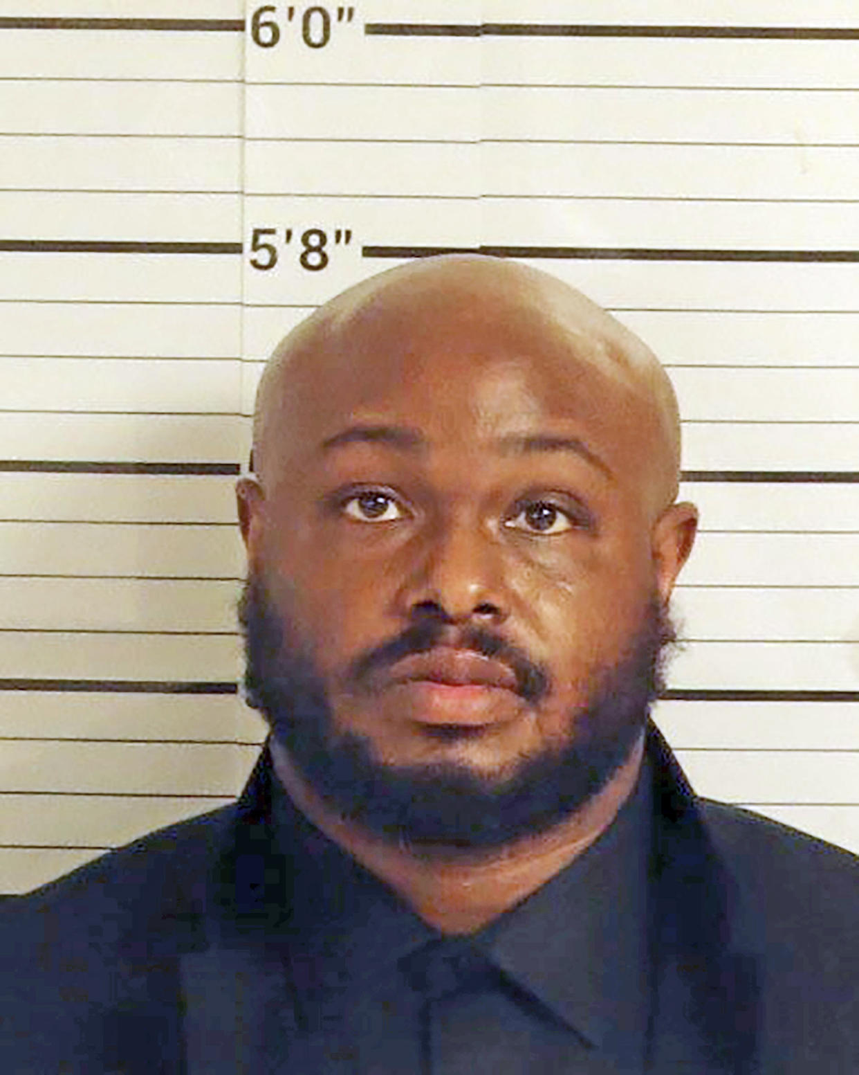 FILE - This Wednesday, Jan. 26, 2023, booking mug shot released by Shelby County Sheriff's Office shows former Memphis Police officer Desmond Mills, Jr., in Memphis, Tenn. Four of five former Memphis police officers charged with murder in the beating death of Tyre Nichols cannot work as law enforcement officers again in Tennessee, a state panel decided Friday, March 24, 2023. The Peace Officer Standards & Training Commission, or P.O.S.T., voted to decertify Demetrius Haley, Emmitt Martin and Justin Smith during a meeting Friday (Shelby County Sheriff's Office via AP)