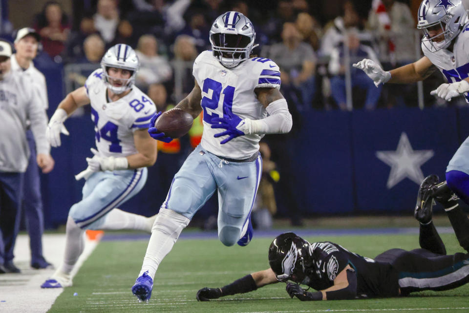 FILE - Dallas Cowboys' Ezekiel Elliott runs during the second half of an NFL football game against the Philadelphia Eagles Saturday, Dec. 24, 2022, in Arlington, Texas. The Dallas Cowboys are reuniting with running back Ezekiel Elliott after agreeing to terms on a contract with the former two-time rushing champion, a person with knowledge of the deal said Monday, April 29, 2024. (AP Photo/Ron Jenkins, File)