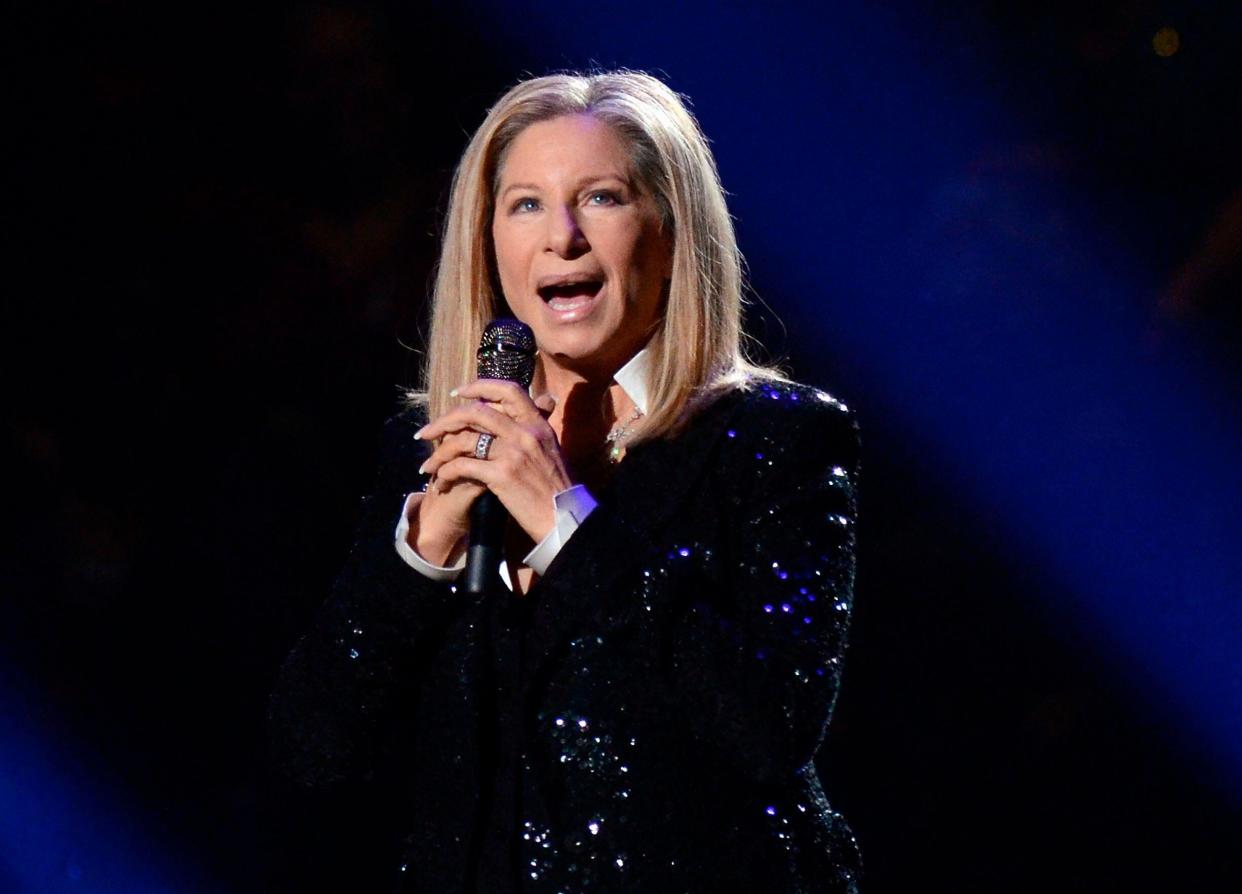 FILE - This Oct. 11, 2012 file photo shows singer Barbra Streisand performing at the Barclays Center in the Brooklyn borough of New York. Streisand accepts the Sherry Lansing Leadership Award from Robert Redford at the Hollywood Reporter's annual Women in Entertainment breakfast on Wednesday, Dec. 9, 2015. This year's event marks the magazine's final ranking of women in its 