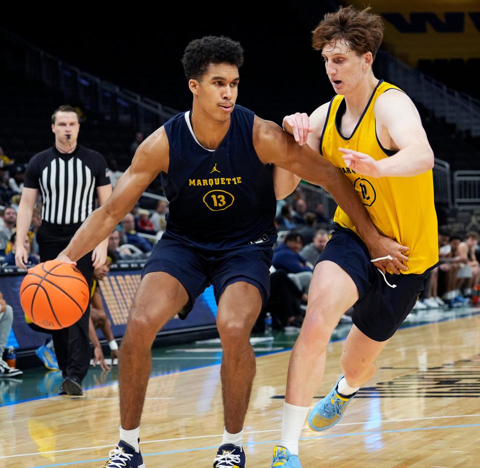 Marquette forward Ben Gold (12) guards forward Oso Ighodaro in the Golden Eagles' open scrimmage this month. Ighodaro says he has seen Gold showing greater strength and confidence as his sophomore season begins.