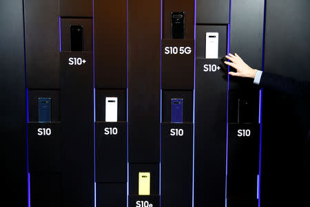 The new Samsung Galaxy S10e, S10, S10+ and the Samsung Galaxy S10 5G smartphones can be seen on a wall arrangement at a press event in London, Britain February 20, 2019. REUTERS/Henry Nicholls