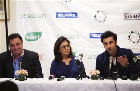 Bollywood actors Ranbir Kapoor (R) and his parents Neetu and Rishi Kapoor (L) answer questions about what it is like to work together during a news conference discussing their new film "Besharam" in New York, September 23, 2013. REUTERS/Lucas Jackson