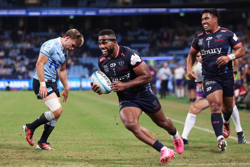 SYDNEY, AUSTRALIA - MARCH 29:  Filipo Daugunu of the Rebels scores the final try during the round six Super Rugby Pacific match between NSW Waratahs and Melbourne Rebels at Allianz Stadium, on March 29, 2024, in Sydney, Australia. (Photo by Matt King/Getty Images)