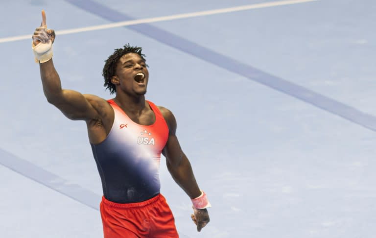 Fred Richard reacts after his floor exercise at the US Olympic gymnastics trials (Kerem YUCEL)