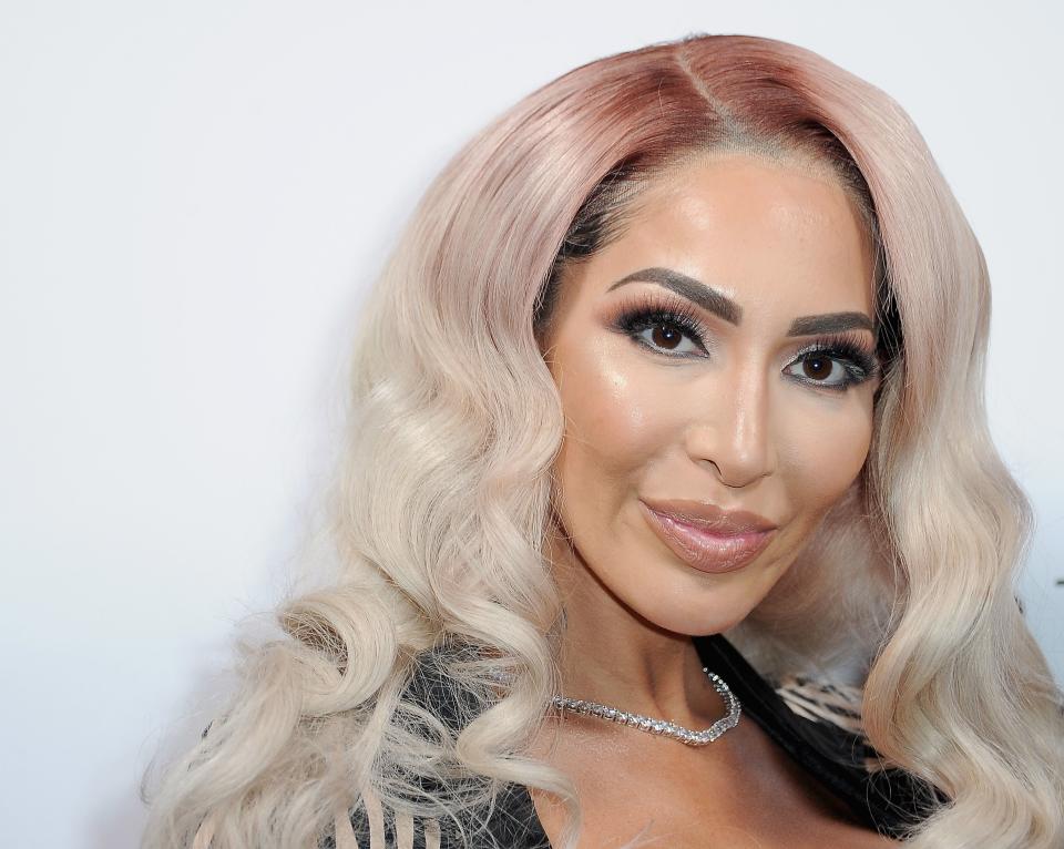 Farrah Abraham smiles with blonde hair