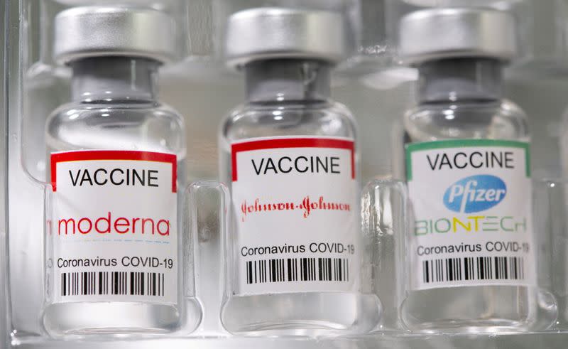 FILE PHOTO: Vials labelled "Moderna, Johnson & Johnson, Pfizer-BioNTech coronavirus disease (COVID-19) vaccine" are seen in this illustration picture