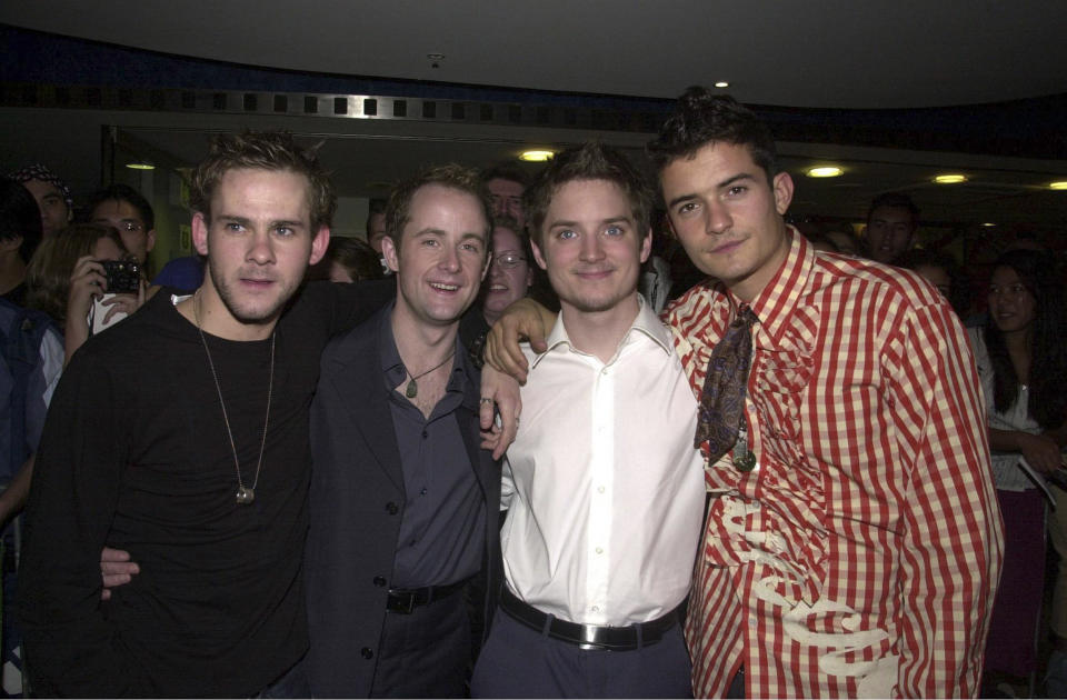 DECEMBER 2001 - DOMINIC MONAGHAN, BILLY BOYD, ELIJAH WOOD AND ORLANDO BLOOM ATTEND THE MOVIE PREMIERE OF THE LORD OF THE RINGS AT THE HOYTS CINEMA IN SYDNEY, AUSTRALIA.  (Photo by Patrick Riviere/Getty Images)
