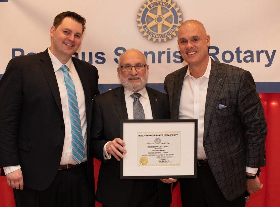 Pictured, at left, President of Paramus Sunrise Rotary Club, Derek Jacobsen, center, Joseph O. D'Arco, Paramus Borough Administrator, honored with Rotary's Service Above Self Award by Mayor Richard A, LaBarbiera, at right.