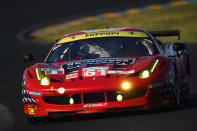 The AF - Corse Michael Waltrip Racing Ferrari 458 of Robert Kauffman, Rui Aguas and Brian Vickers in action during Le Mans 24 Hour race at the Circuit de la Sarthe on June 17, 2012 in Le Mans, France. (Photo by Bryn Lennon/Getty Images)