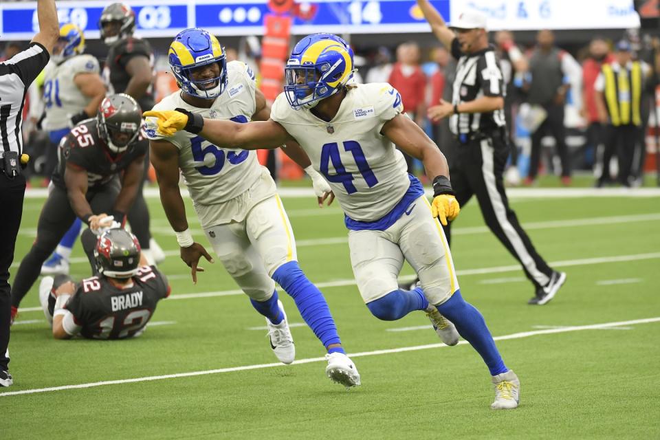 Rams inside linebacker Kenny Young celebrates after sacking Tampa Bay Buccaneers quarterback Tom Brady.