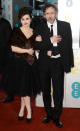 Helena Bonham Carter and Tim Burton attend the EE British Academy Film Awards at The Royal Opera House on February 10, 2013 in London, England. (Photo by Ian Gavan/Getty Images)