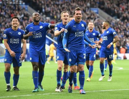 Britain Soccer Football - Leicester City v Crystal Palace - Premier League - King Power Stadium - 22/10/16 Leicester City's Christian Fuchs celebrates scoring their third goal with teammates Action Images via Reuters / Alan Walter Livepic