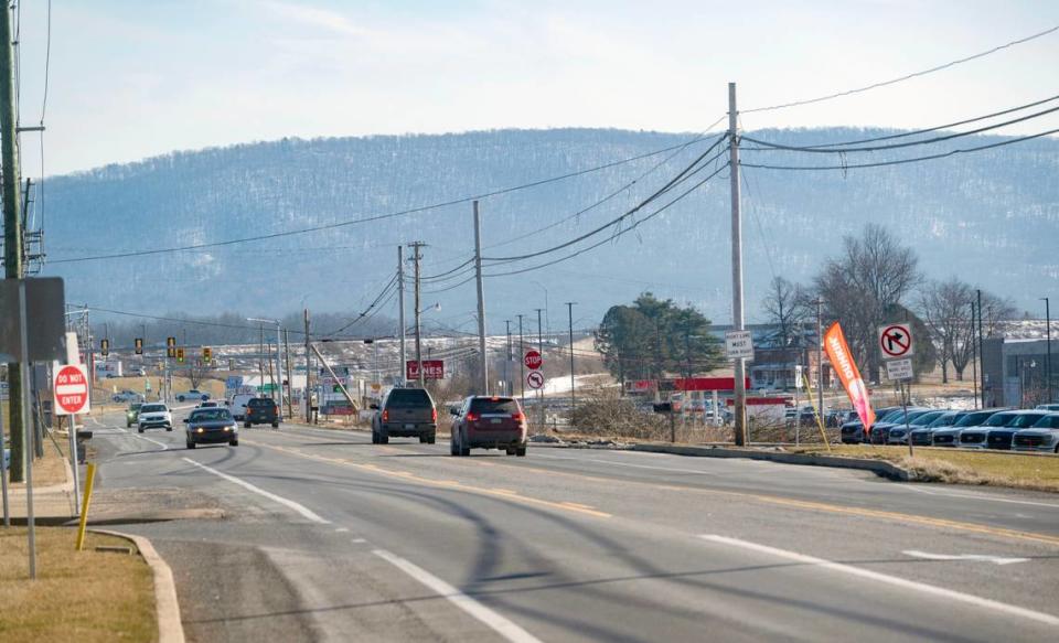 Traffic moves along Benner Pike where several new business have emerged in recent years including Dunkin’ and Giant. Abby Drey/adrey@centredaily.com