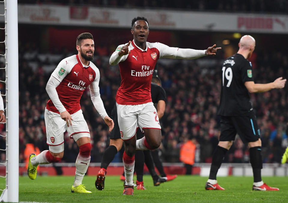 Danny Welbeck celebrates his goal for Arsenal against West Ham United in the League Cup quarterfinals. (Getty)
