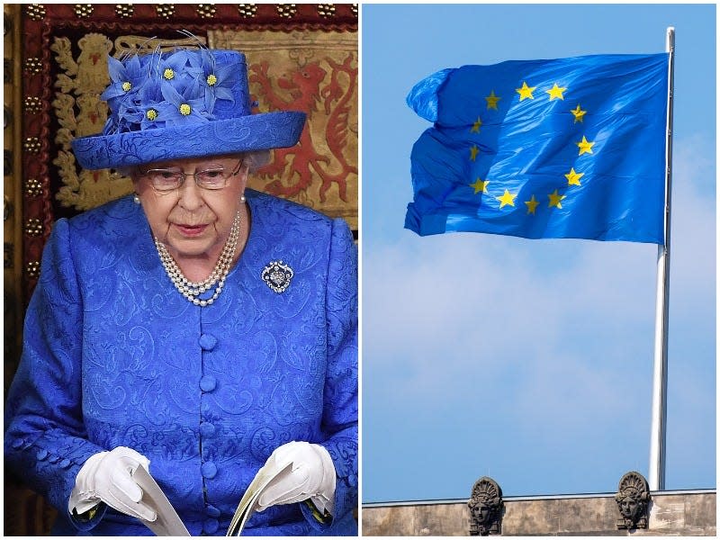 Queen Elizabeth wearing a blue hat with yellow stars, similar to the European Union flag.