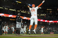 San Francisco Giants' Thairo Estrada (39) celebrates after scoring on Brandon Crawford's two-run home run against the Arizona Diamondbacks during the ninth inning of a baseball game in San Francisco, Tuesday, Aug. 16, 2022. The Giants won 2-1. (AP Photo/Godofredo A. Vásquez)