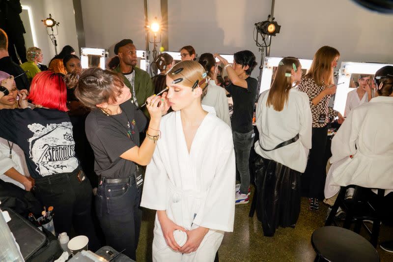 A model backstage is prepared for the Tom Ford AW20 Show at Milk Studios in Los Angeles