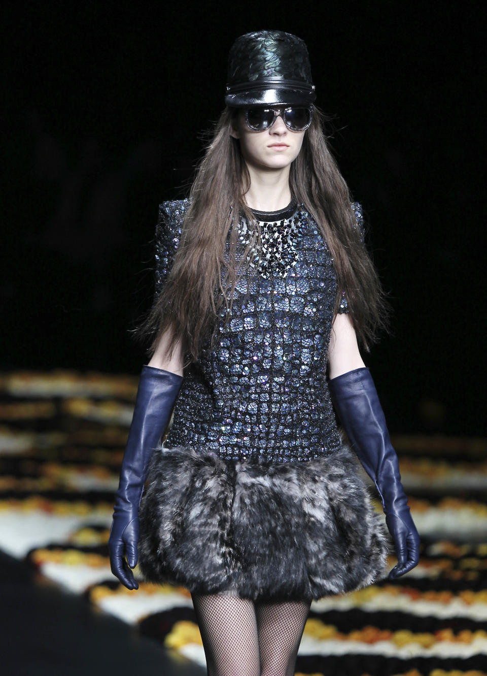 A model wears a creation part of the Roberto Cavalli women's Fall-Winter 2012-13 fashion collection, during the fashion week in Milan, Italy, Monday, Feb. 27, 2012. (AP Photo/Antonio Calanni)