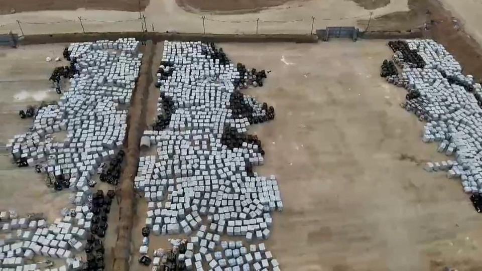 PHOTO: Humanitarian aid waits for distribution at the offloading area of the JLOTS pier in Gaza. (COGAT/X)