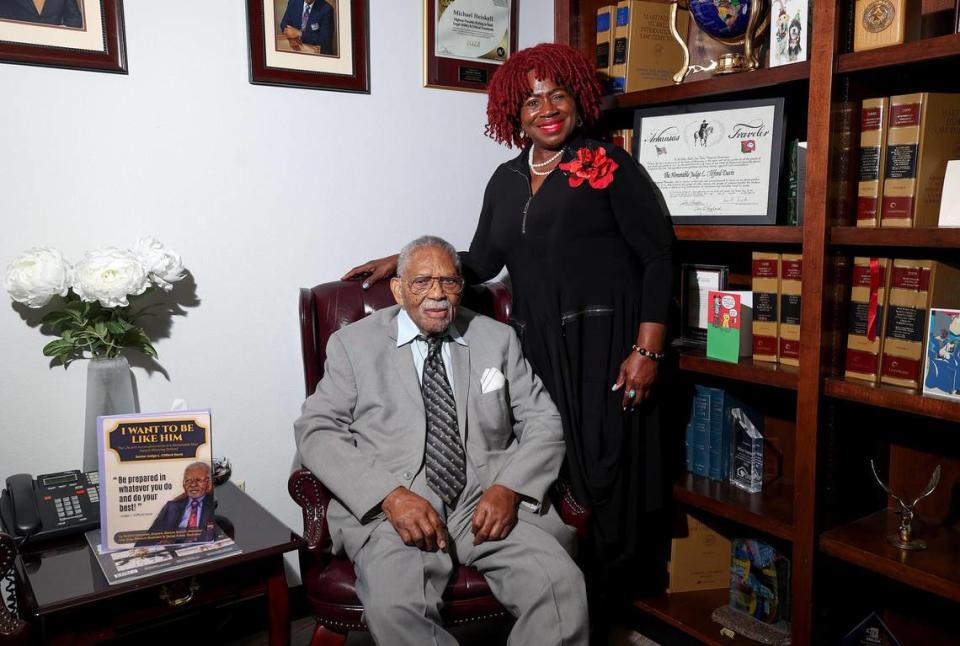 Judge L. Clifford Davis is photographed with Bobbie Edmonds, a local attorney who released a book about Davis’ life.