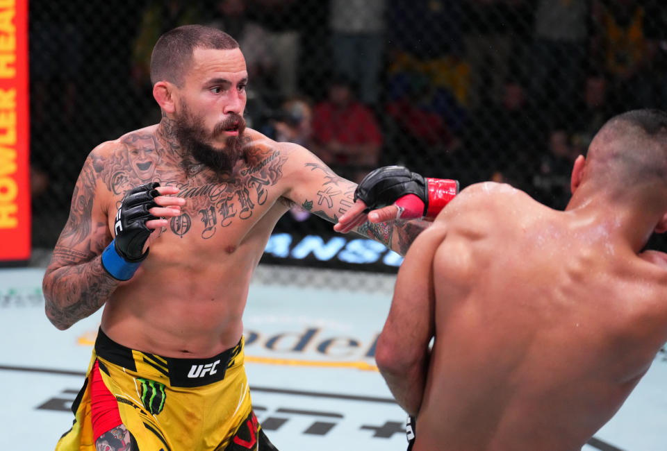 LAS VEGAS, NEVADA - APRIL 30: (L-R) Marlon Vera of Ecuador punches Rob Font in a bantamweight fight during the UFC Fight Night event at UFC APEX on April 30, 2022 in Las Vegas, Nevada. (Photo by Chris Unger/Zuffa LLC)