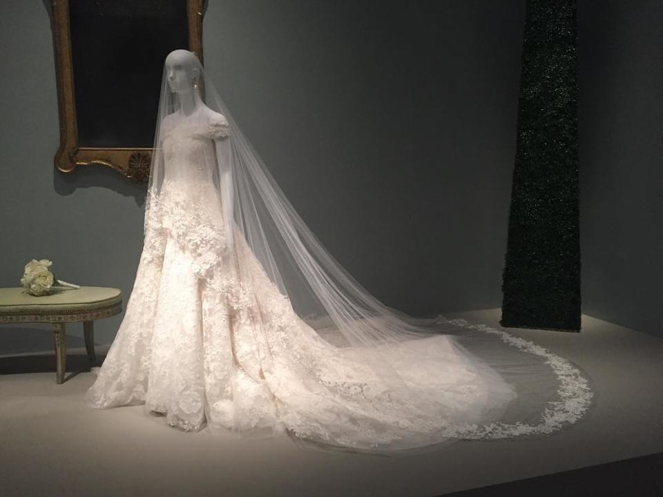 <p>Titled <em>The Glamour and Romance of Oscar de la Renta</em>, the retrospective will open to the public Sunday and feature nearly 70 ensembles from the late designer's archives, including loans from top clients like Beyoncé herself. Style legend André Leon Talley appropriately curated the selection, and he described the team being "very anxious" to receive Amal's bridal addition. "We wanted it [in San Francisco last year], but Mrs. Clooney reached me through her assistant to say she felt it was too early to have her dress in an exhibit after she married [George]," he told <a rel="nofollow noopener" href="http://wwd.com/eye/people/oscar-de-la-renta-exhibition-opening-museum-of-fine-arts-houston-11021167/" target="_blank" data-ylk="slk:WWD;elm:context_link;itc:0;sec:content-canvas" class="link "><em>WWD</em></a>. Now if only we could book a quick flight to H-Town.</p> <h4>@amuseabroad</h4>