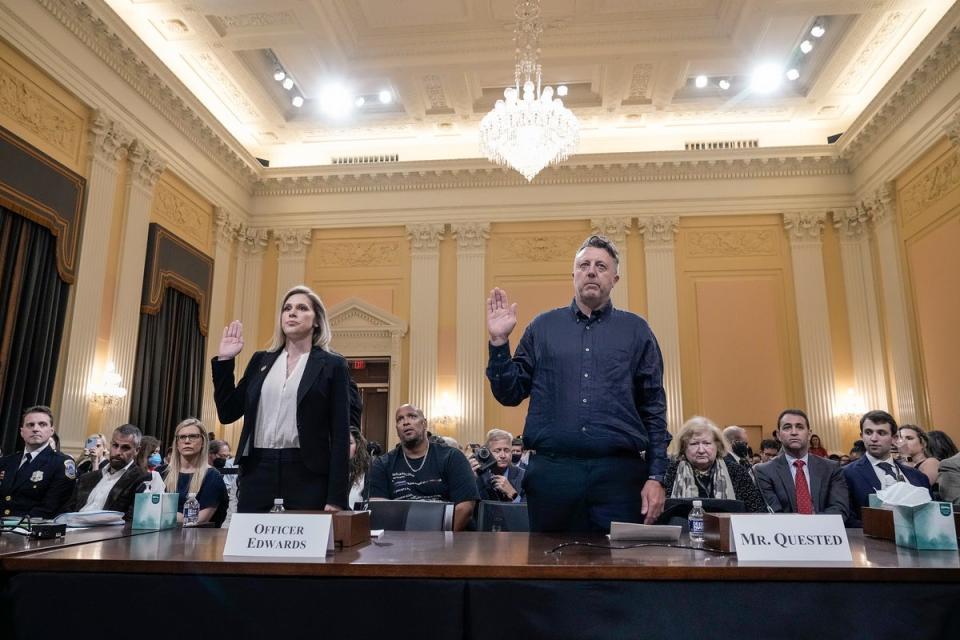 U.S. Capitol Police Officer Caroline Edwards and Nick Quested, a documentary filmmaker who was embedded with the Proud Boys, a far-right militia group, are sworn-in during a hearing (Getty Images)