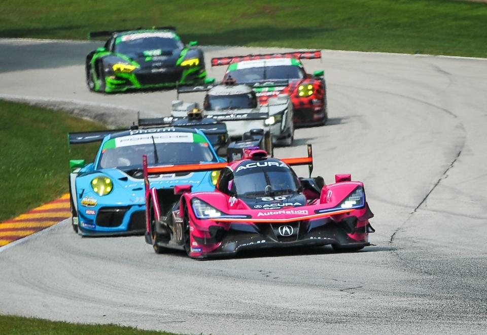 Olivier Pla in the the No. 60 Acura leads a group of cars into Turn 13 last year during the IMSA SportsCar Weekend race at Road America.