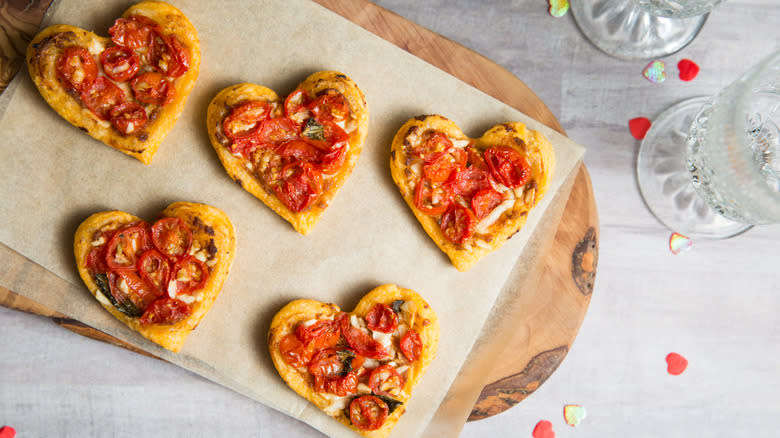 mini heart pastries on table