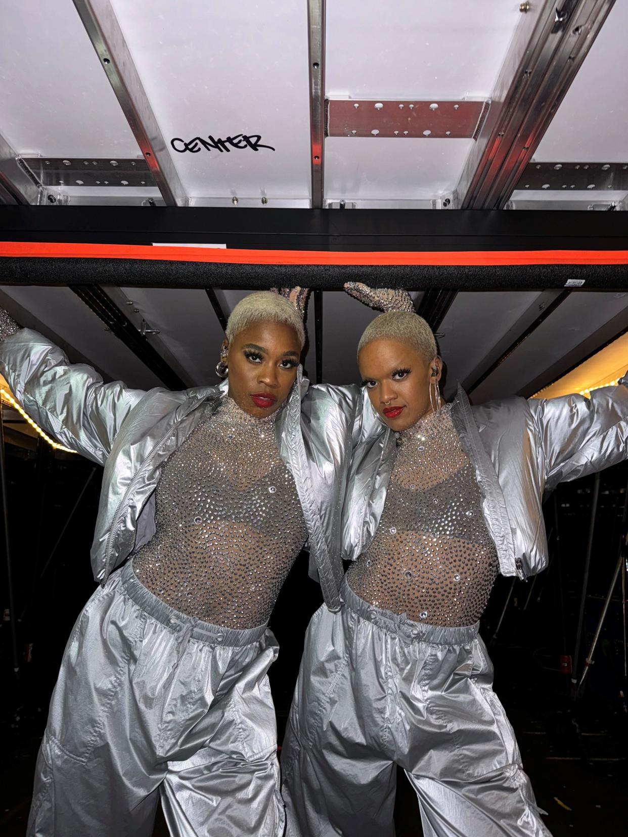 Mariah Carey dancers Brittanie Bianca and Urbandale High School alum Hannah Oyibo (right) on the superstar's Christmas tour.