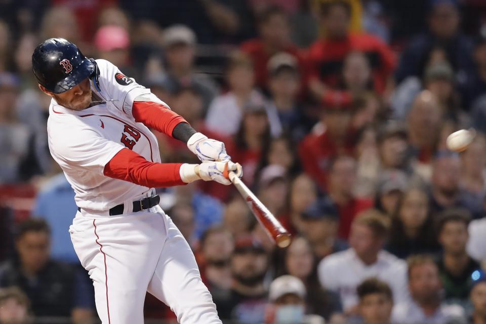 Boston Red Sox's Trevor Story hits a grand slam against the Seattle Mariners during the third inning of a baseball game Friday, May 20, 2022, in Boston. (AP Photo/Michael Dwyer)