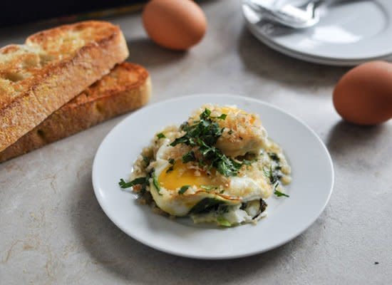 <strong>Get the <a href="http://www.howsweeteats.com/2012/12/fontina-and-spinach-baked-eggs-with-garlic-brown-butter-breadcrumbs/" target="_hplink">Fontina and Spinach Baked Eggs recipe</a> by How Sweet It Is</strong>