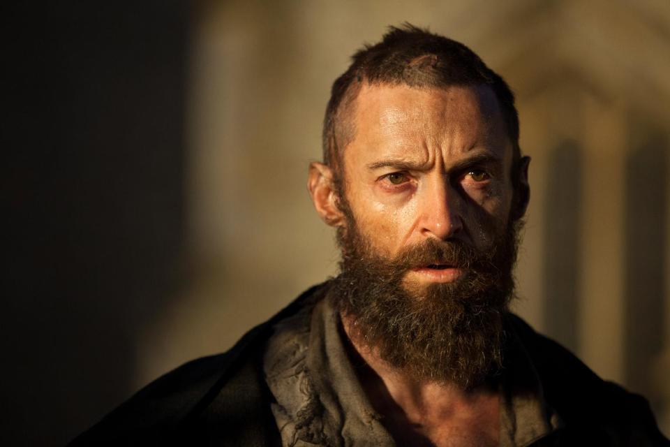 FILE - This publicity film image released by Universal Pictures shows Hugh Jackman as Jean Valjean in a scene from "Les Miserables." The film is nominated for an Academy Award in the Makeup and Hairstyling category. The 85th Academy Awards air live on ABC on Sunday, Feb. 24, 2013. (AP Photo/Universal Pictures, Laurie Sparham, File)