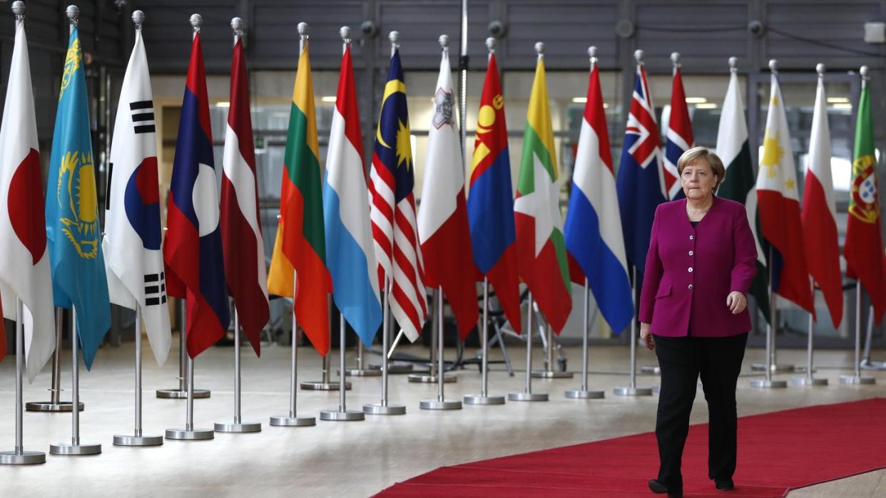 Bundeskanzlerin Angela Merkel kommt zum Asem-Treffen in Brüssel. Foto: Alastair Grant/AP