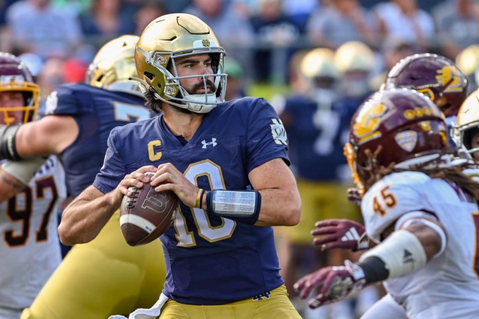 Notre Dame Fighting Irish quarterback Sam Hartman (10) throws in the third quarter against the Central Michigan Chippewas at Notre Dame Stadium.