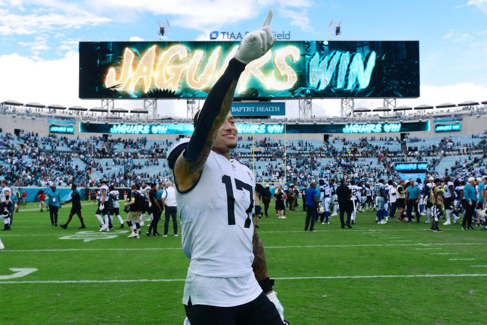 Jacksonville Jaguars tight end Evan Engram (17) points to the fans in the stands as he walks off the field following the team's shutout victory over the Colts. The Jaguars went into the first half with a 17 to 0 lead over the Colts and went on to win the game 24 to 0. The Jacksonville Jaguars hosted the Indianapolis Colts at TIAA Bank field in Jacksonville, FL Sunday, September 18, 2022. [Bob Self/Florida Times-Union]