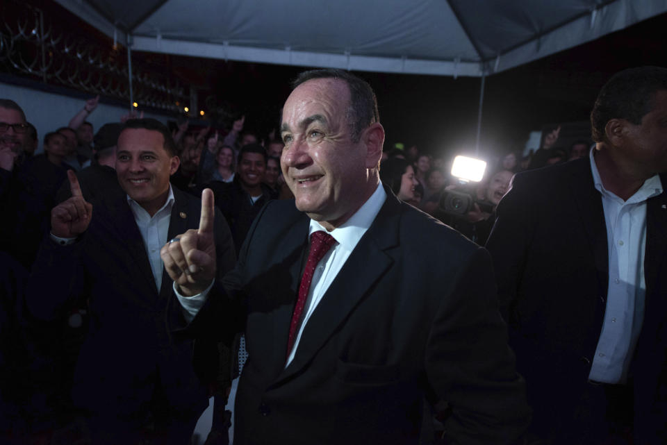 Alejandro Giammattei, presidential candidate of the Vamos party, arrives to his campaign headquarters during general elections in Guatemala City, Sunday, June 16, 2019. (AP Photo/Santiago Billy)