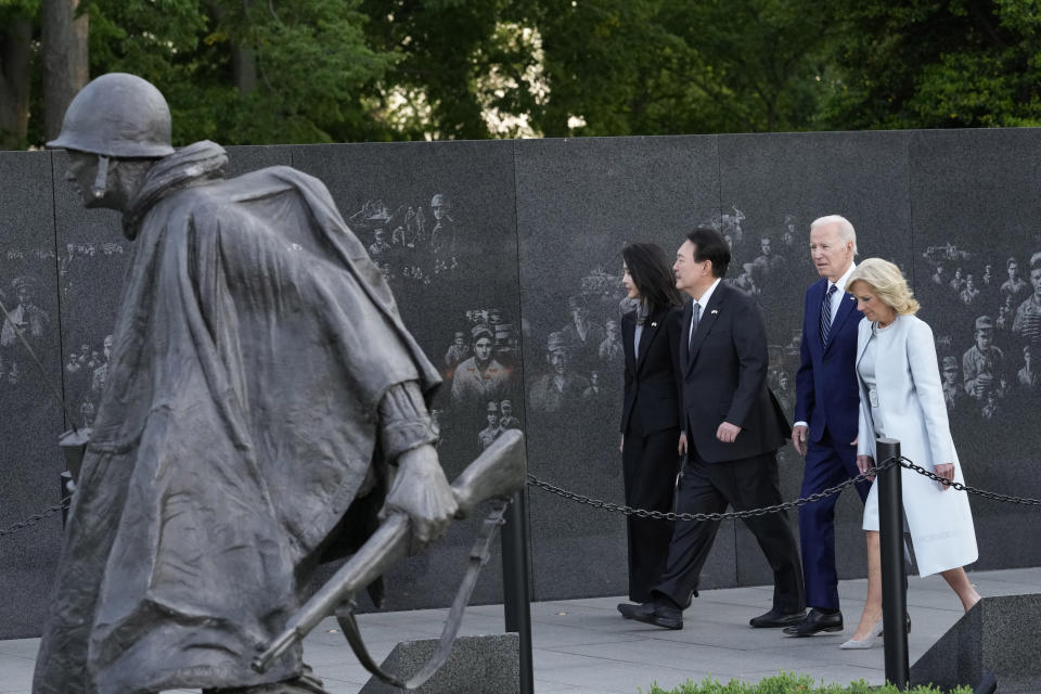 President Joe Biden, first lady Jill Biden, South Korea's President Yoon Suk Yeol and his wife Kim Keon Hee visit the Korean War Veterans Memorial in Washington, Tuesday, April 25, 2023. (AP Photo/Susan Walsh)