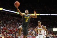 Baylor guard Jared Butler (12) drives to the basket ahead of Iowa State forward Zion Griffin (0) during the first half of an NCAA college basketball game Wednesday, Jan. 29, 2020, in Ames, Iowa. (AP Photo/Charlie Neibergall)