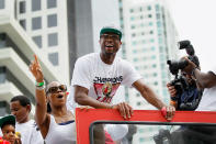 MIAMI, FL - JUNE 25: Dwyane Wade of the Miami Heat rides in a victory parade through the streets during a celebration for the 2012 NBA Champion Miami Heat on June 25, 2012 in Miami, Florida. The Heat beat the Oklahoma Thunder to win the NBA title. (Photo by Joe Raedle/Getty Images)