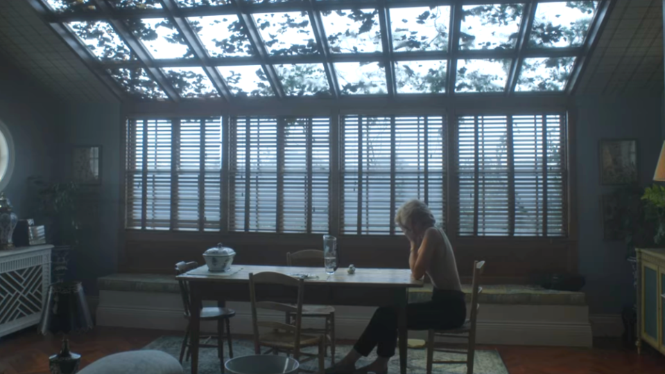 Princess Diana alone at a table in Kensington Palace in Episode 9 of Season 5 of "The Crown"