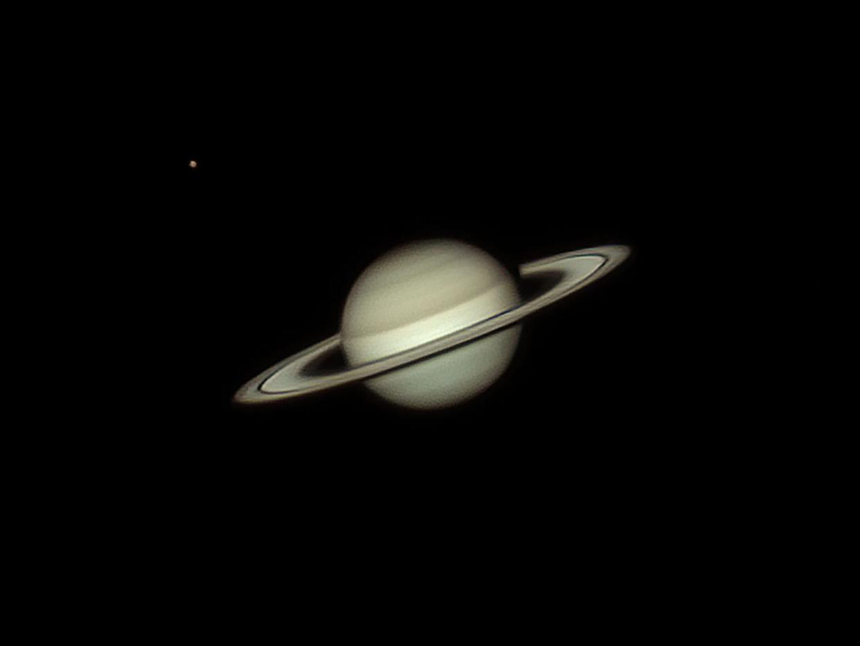 This July 7, 2023, photo of Saturn was made with the author's telescope. Saturn's largest moon Titan appears to the upper left of Saturn. Saturn will be one of the evening sky objects to be observed with telescopes at a free public viewing session in Stedman on Nov. 16, 2023.
