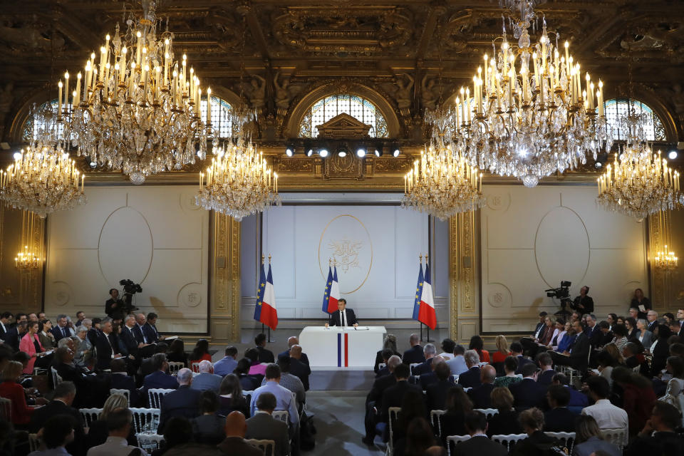 French President Emmanuel Macron delivers a speech at the Elysee Palace Thursday, April 25, 2019 in Paris. Macron makes a speech at the Elysee presidential palace based on three months of national debate aimed at addressing the protesters' concerns through town hall meetings and collecting complaints online. (AP Photo/Michel Euler)