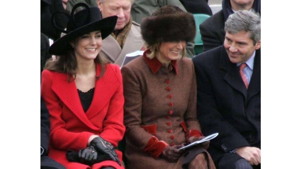 Kate and her parents sharing a giggle at Sandhurst