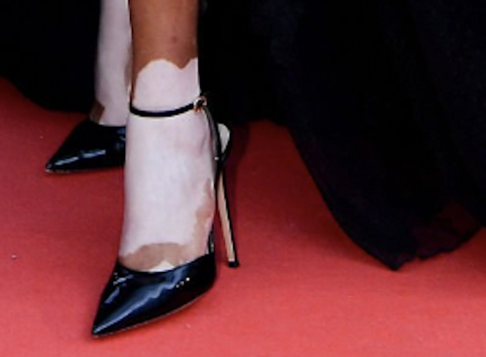 Winnie Harlow’s sleek black slingback pumps at the 77th annual Cannes Film Festival.