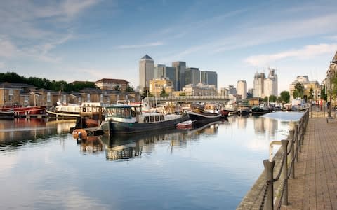 Greenland Dock before the skyscrapers of Canary Wharf - Credit: GETTY