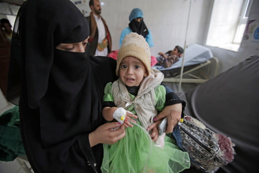 A girl with a suspected cholera infection is treated at a hospital in Sanaa, Yemen, Monday, Sept. 9, 2019. The World Health Organization and UNICEF launched a diphtheria vaccination campaign this month in war-torn Yemen targeting over 2.8 million children between the ages of six weeks and 15 years. (AP Photo/Hani Mohammed)